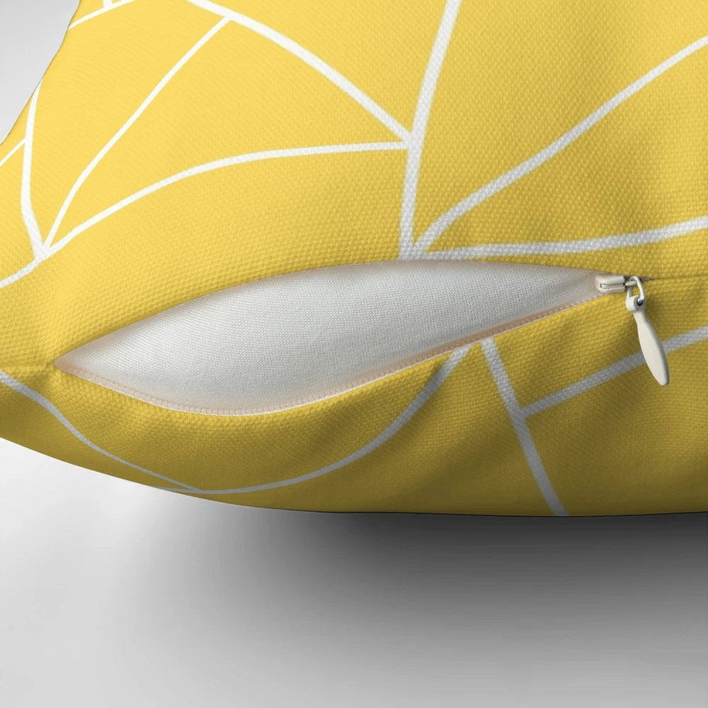 Mustard yellow and white pillow with abstract geometric lines and mosaic pattern design