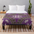 Native American inspired plush blanket with morning star and tipi design