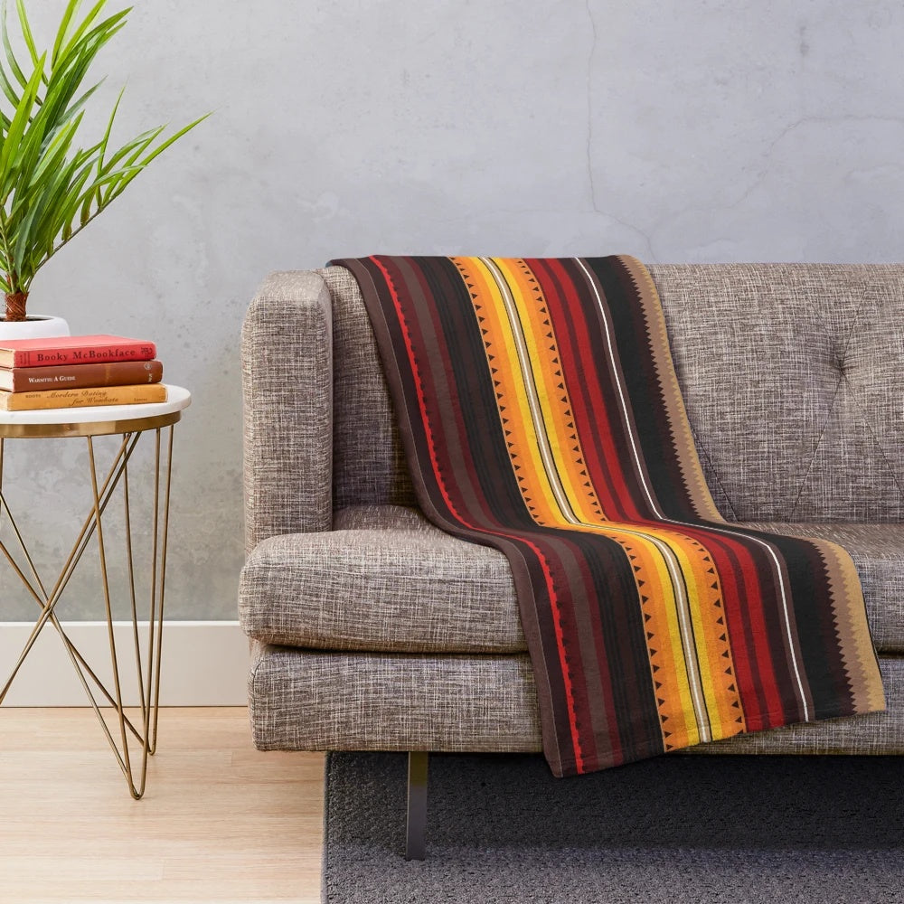Plush blanket with vibrant native american inspired geometric pattern