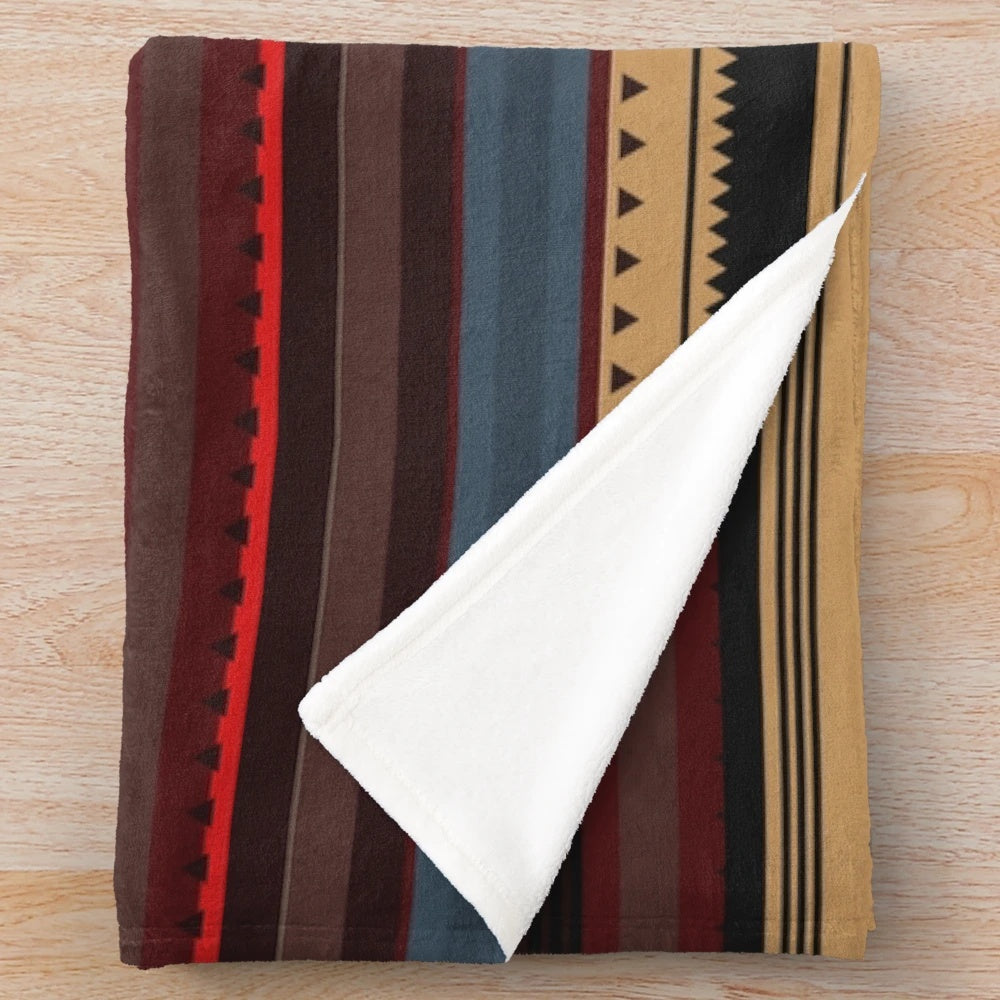 Plush blanket with vibrant native american inspired geometric pattern