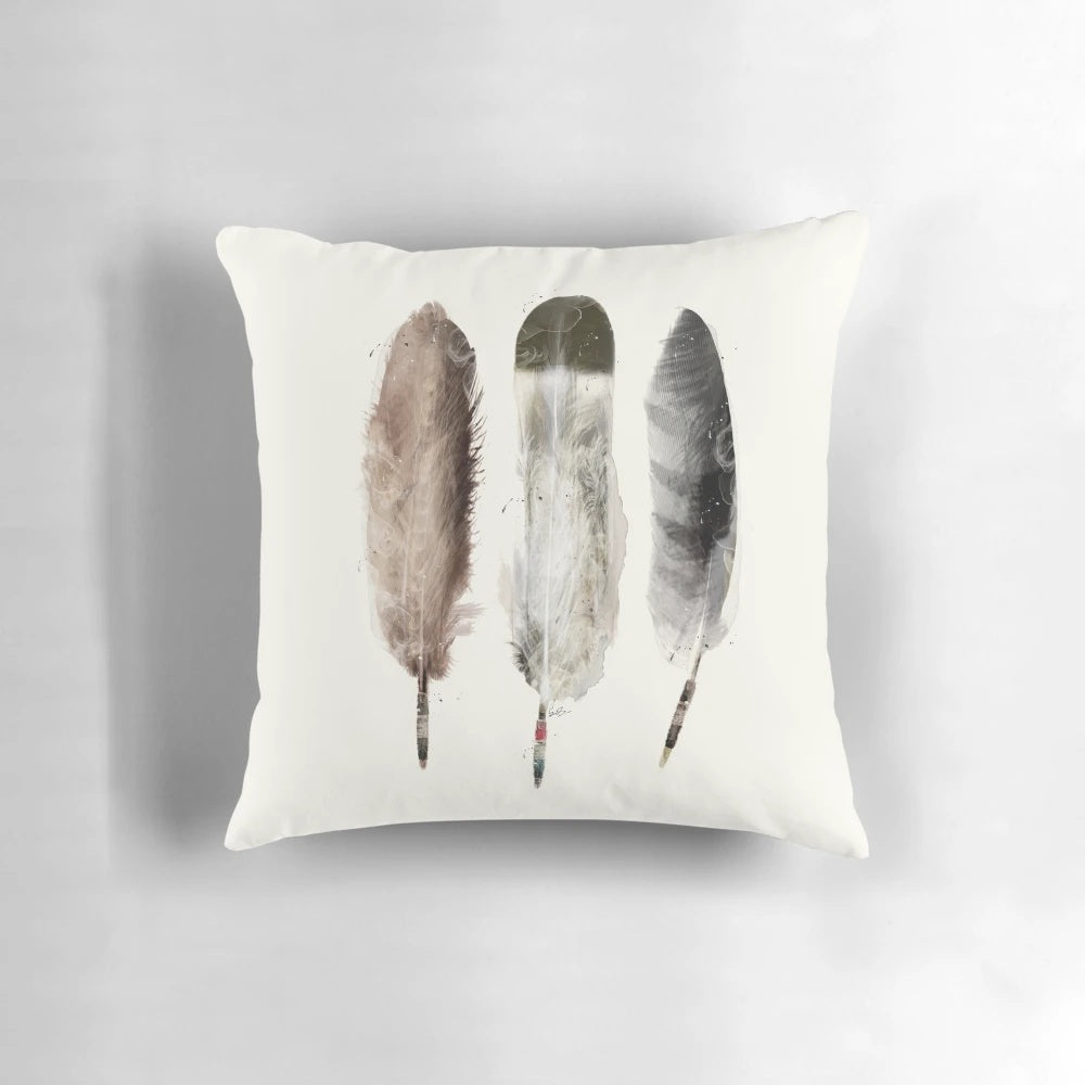 Colorful native eagle feather design on a soft, cozy pillow