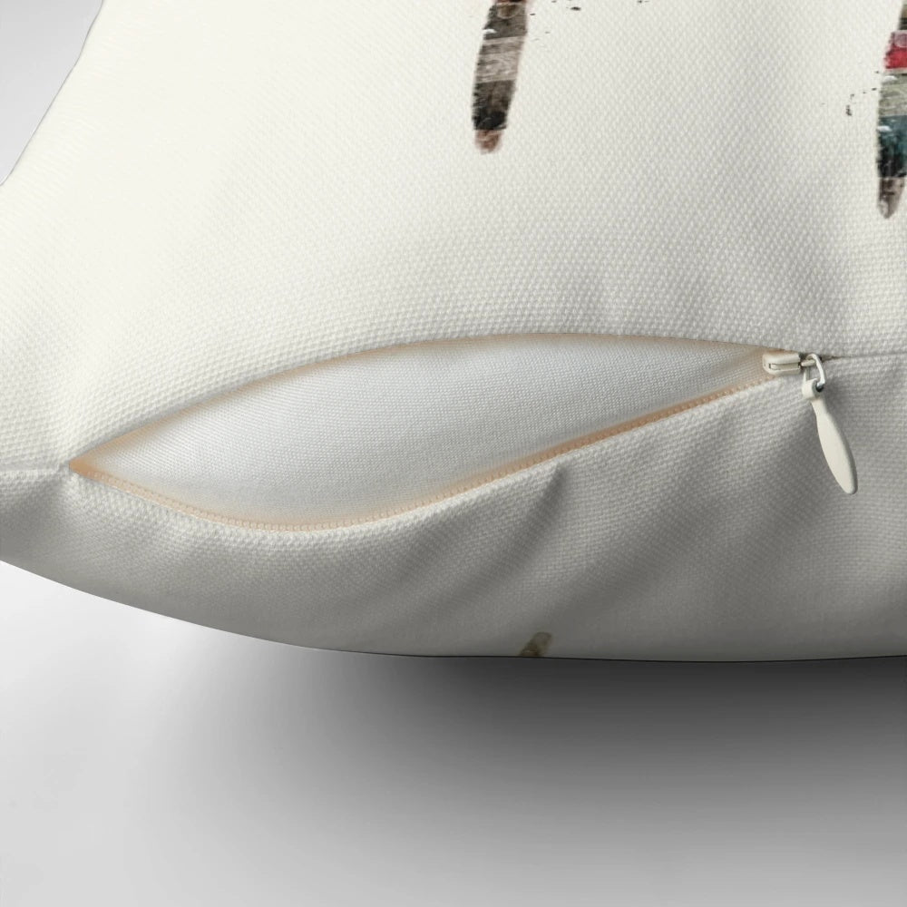Colorful native eagle feather design on a soft, cozy pillow
