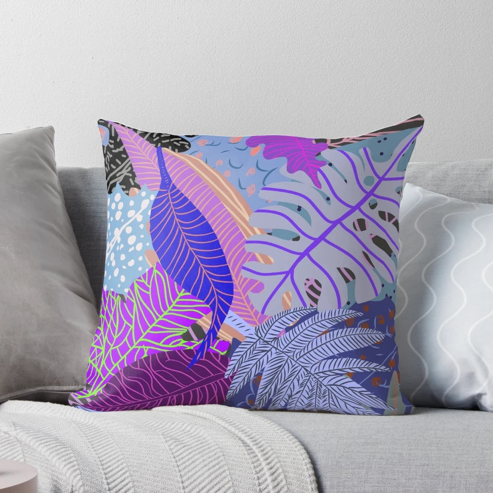 Colorful and earthy botanical throw pillow featuring a vibrant nature leaves design