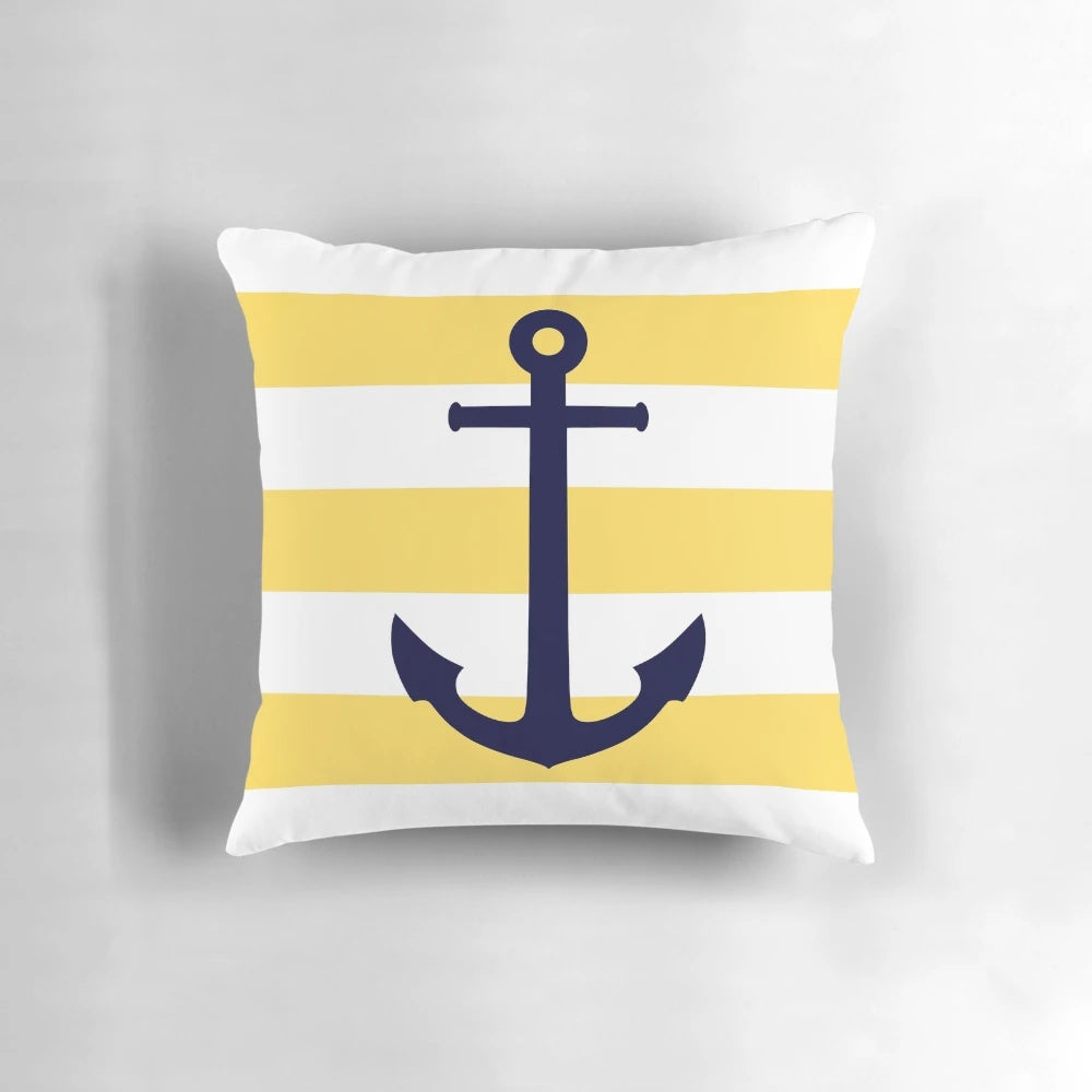 Mustard yellow and navy blue striped throw pillow with anchor design
