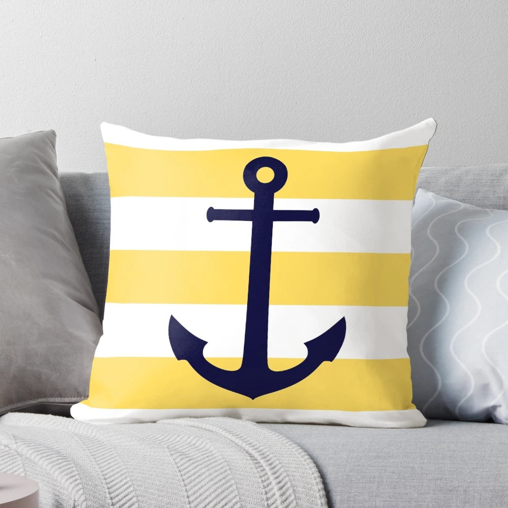 Mustard yellow and navy blue striped throw pillow with anchor design