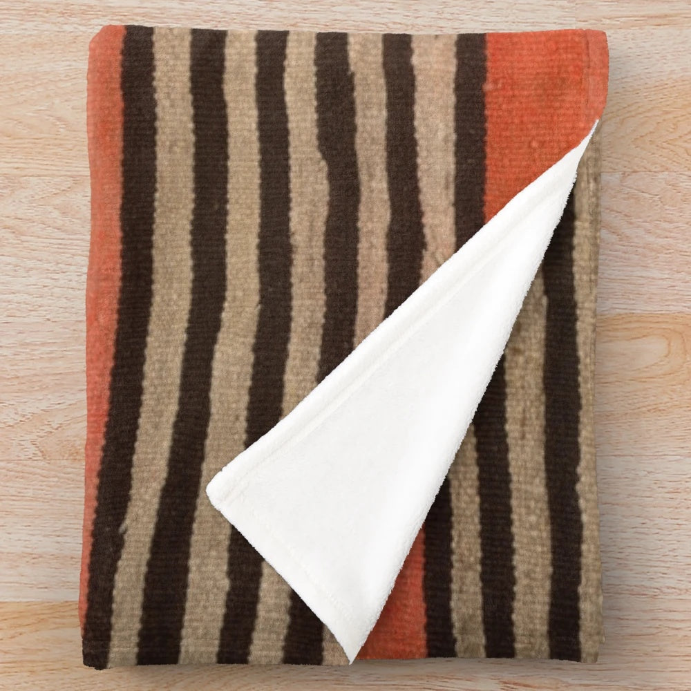 Vibrant Navajo-inspired plush blanket with geometric patterns