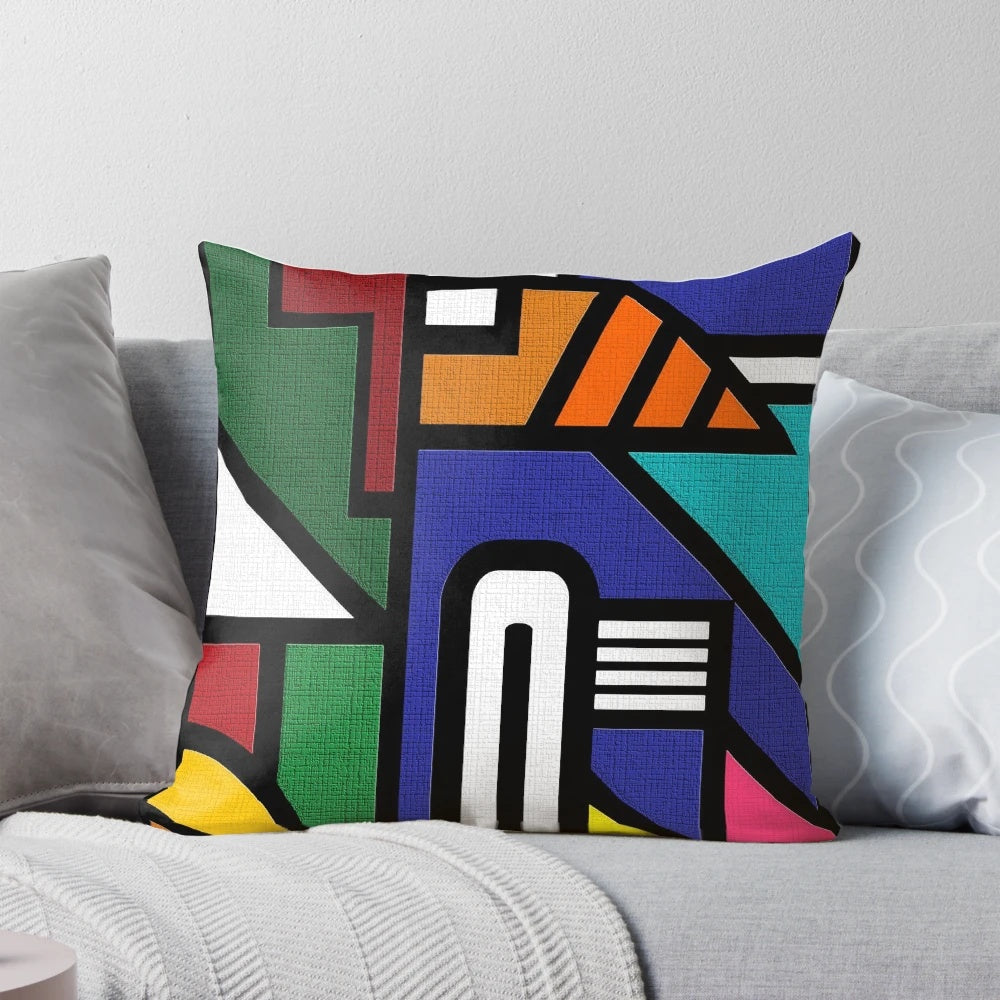 Multicolored decorative pillow featuring Ndebele-inspired geometric patterns