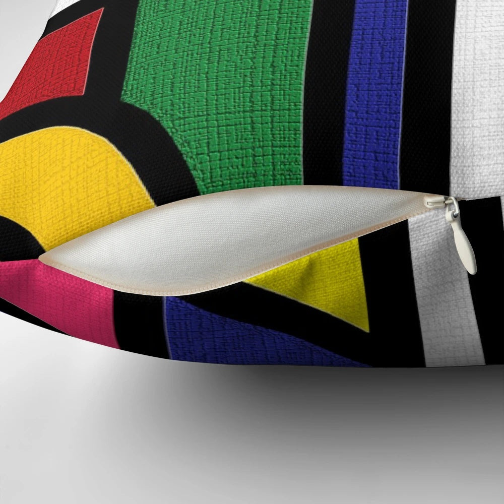 Multicolored decorative pillow featuring Ndebele-inspired geometric patterns