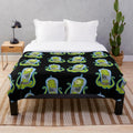 Kang and Kodos inspired colorful plush blanket with neon alien and monster design