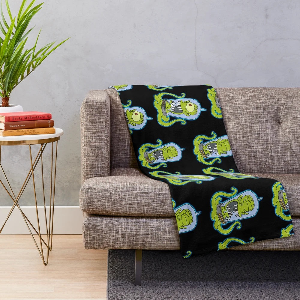 Kang and Kodos inspired colorful plush blanket with neon alien and monster design