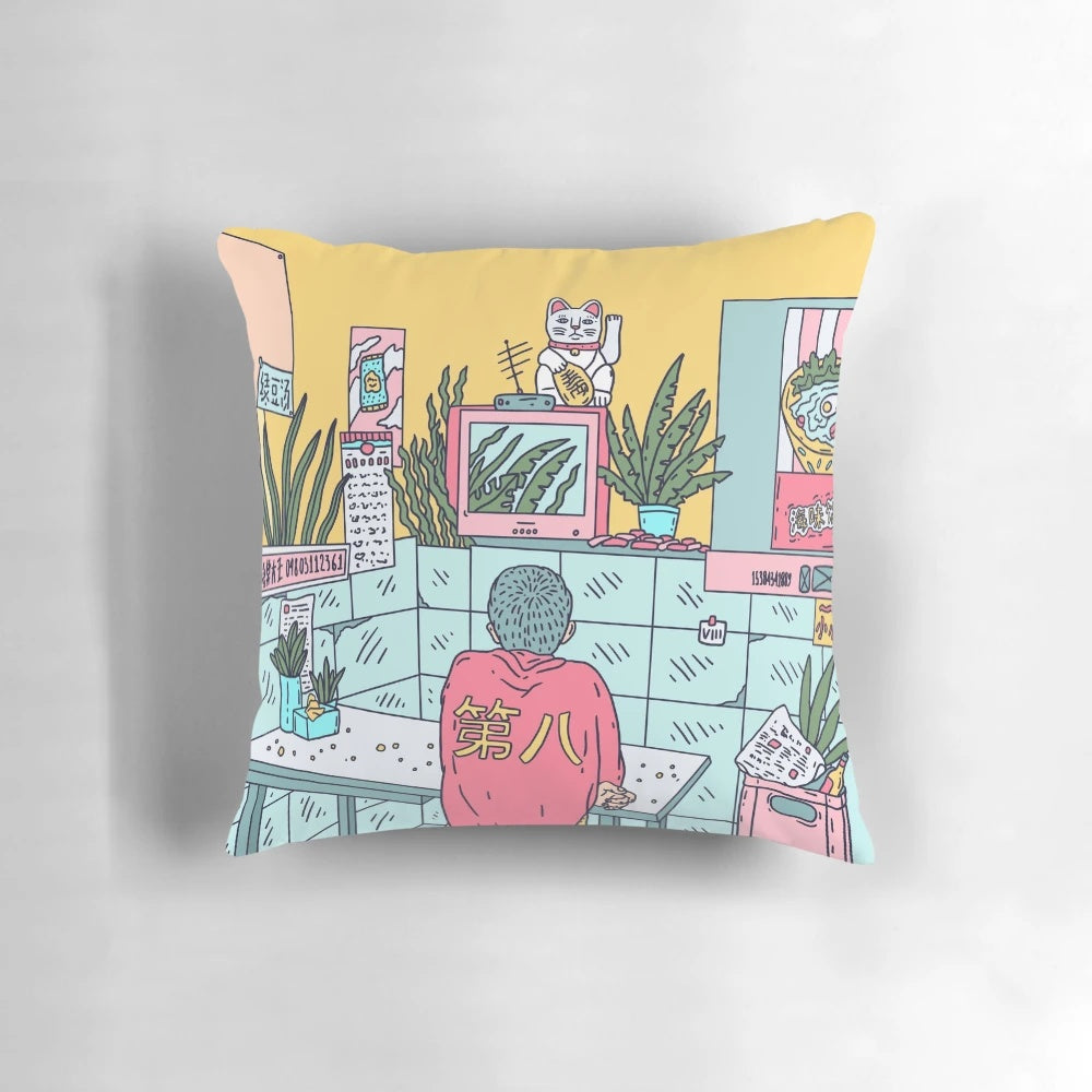 Colorful neon pink, blue, and yellow decorative pillow with Asian-inspired plants and lucky cat design