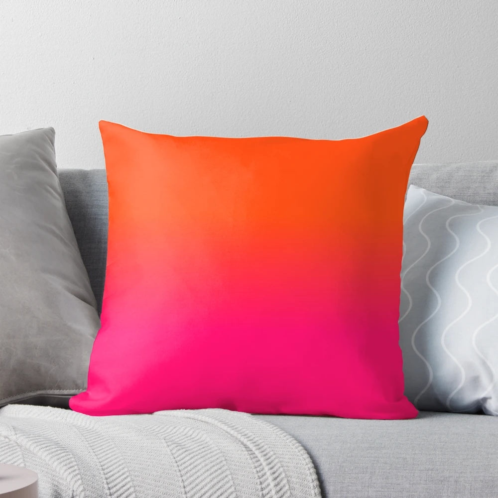Neon orange and pink ombre fade throw pillow with a bright, modern color design