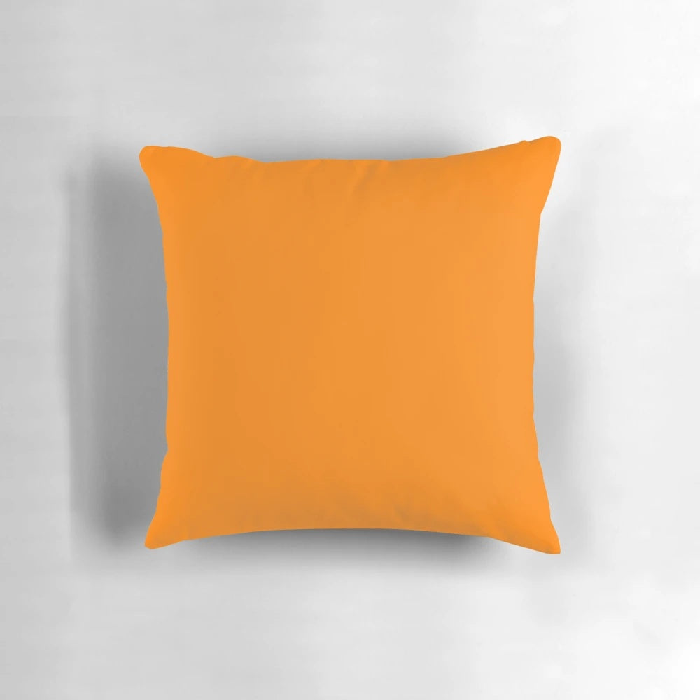 Bright neon orange pillow, perfect for adding a pop of color to your home decor.