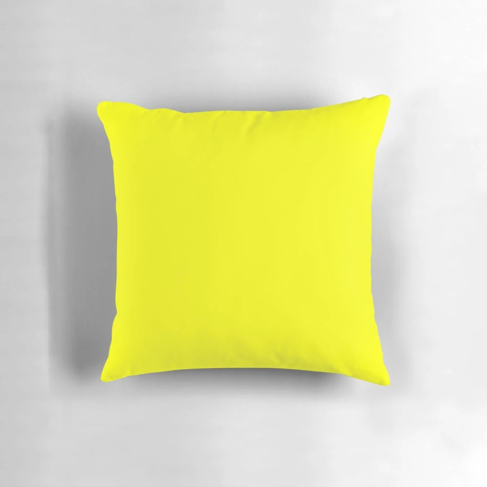 Neon yellow decorative throw pillow, perfect for adding a pop of color to any room.