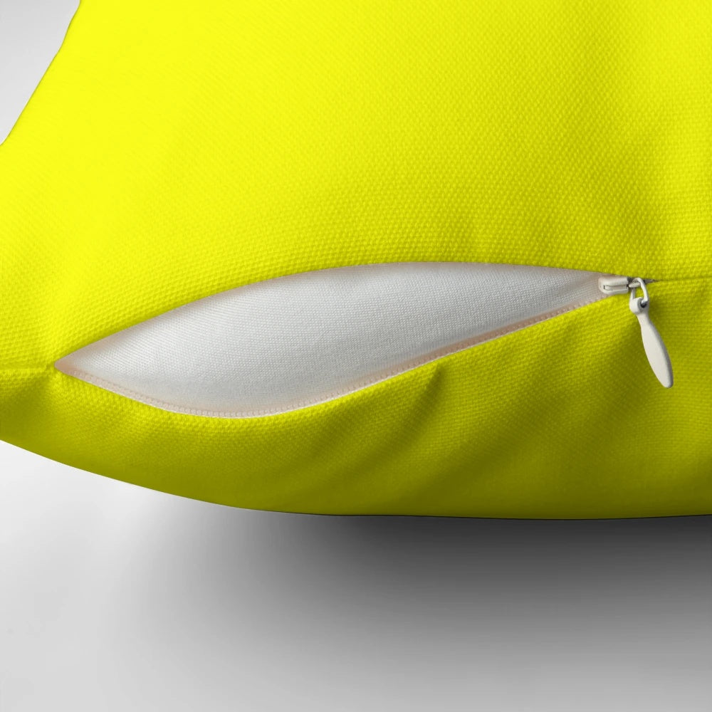 Neon yellow decorative throw pillow, perfect for adding a pop of color to any room.