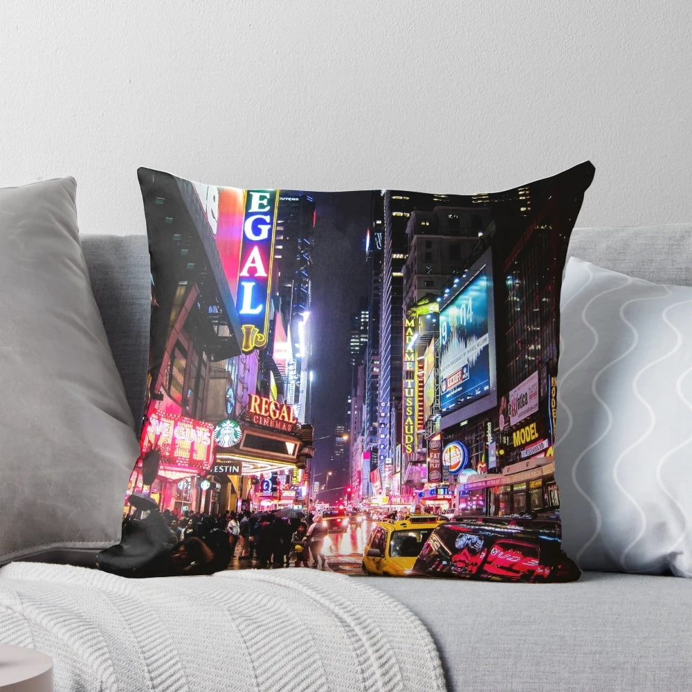 Pillow featuring a colorful and dynamic night skyline of New York City
