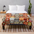 Colorful and geometric plush blanket featuring illustrations of North American owls