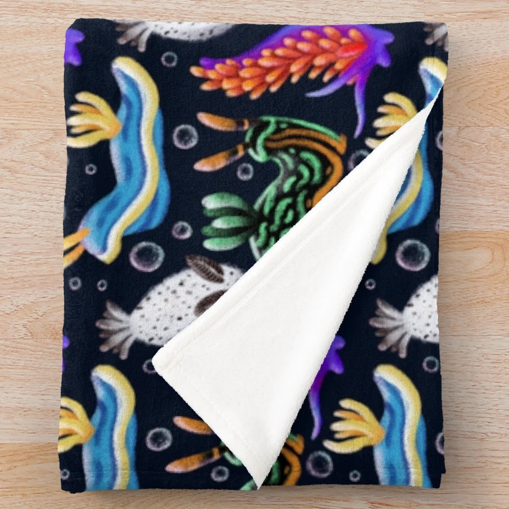 Colorful nudibranchs plush blanket with vibrant sea slug design