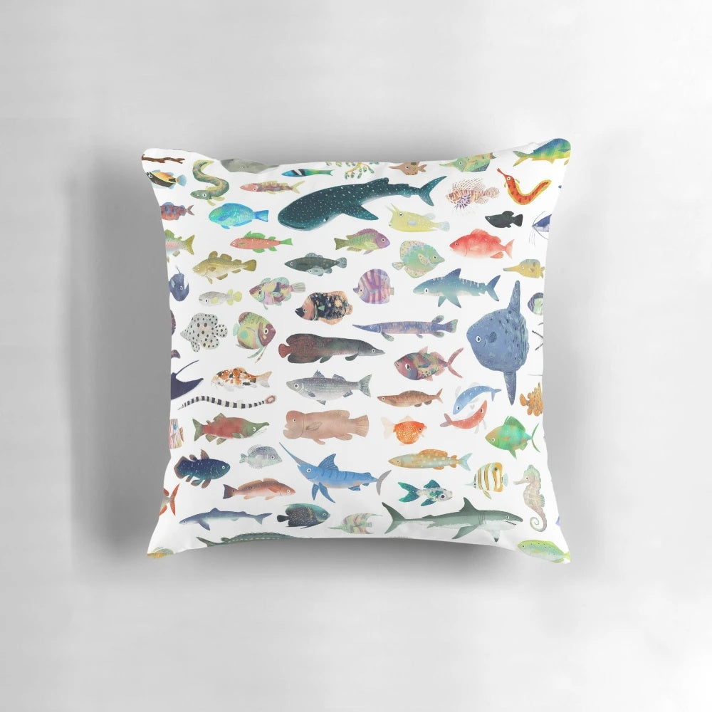 Colorful and lifelike fish pillow featuring a variety of marine creatures, including sharks and whale sharks.