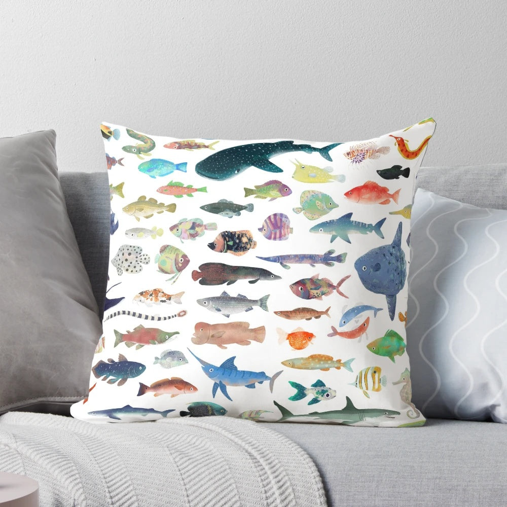 Colorful and lifelike fish pillow featuring a variety of marine creatures, including sharks and whale sharks.