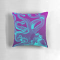 Colorful octopus-shaped pillow in blue and purple tones.