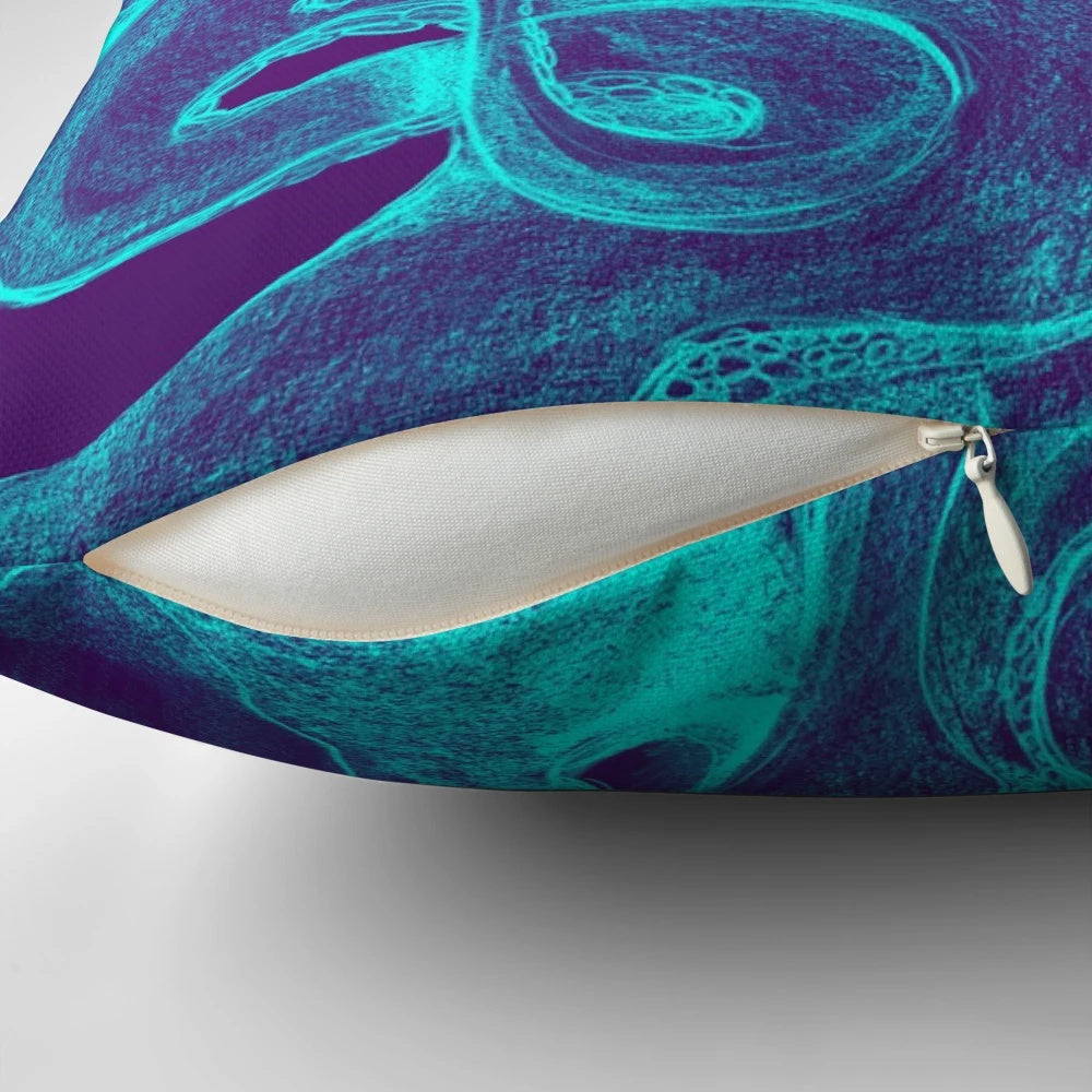 Colorful octopus-shaped pillow in blue and purple tones.