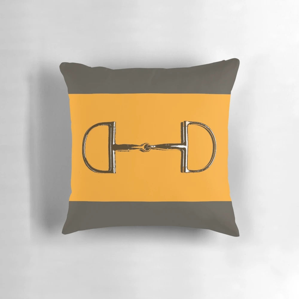 Vibrant orange and taupe colored horse bit themed pillow