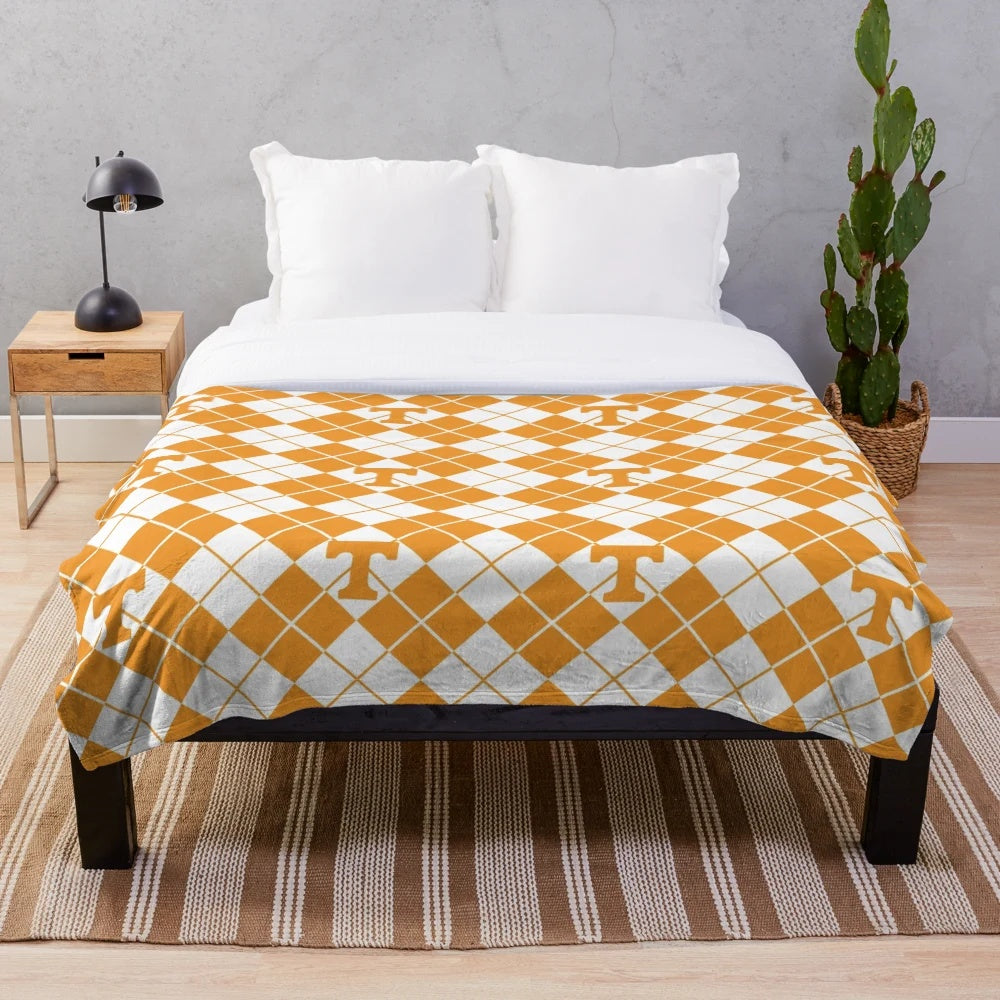 Orange and white checkerboard pattern plush blanket
