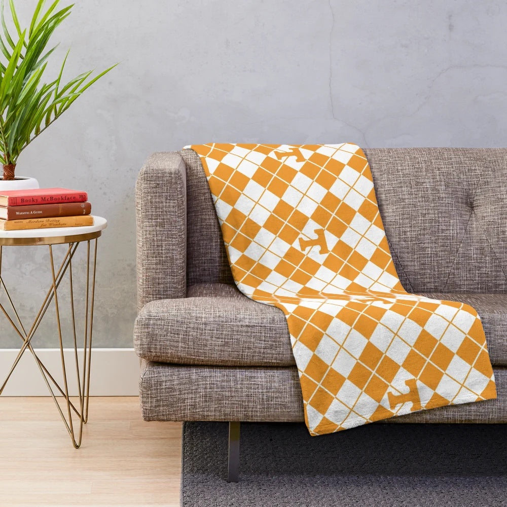 Orange and white checkerboard pattern plush blanket