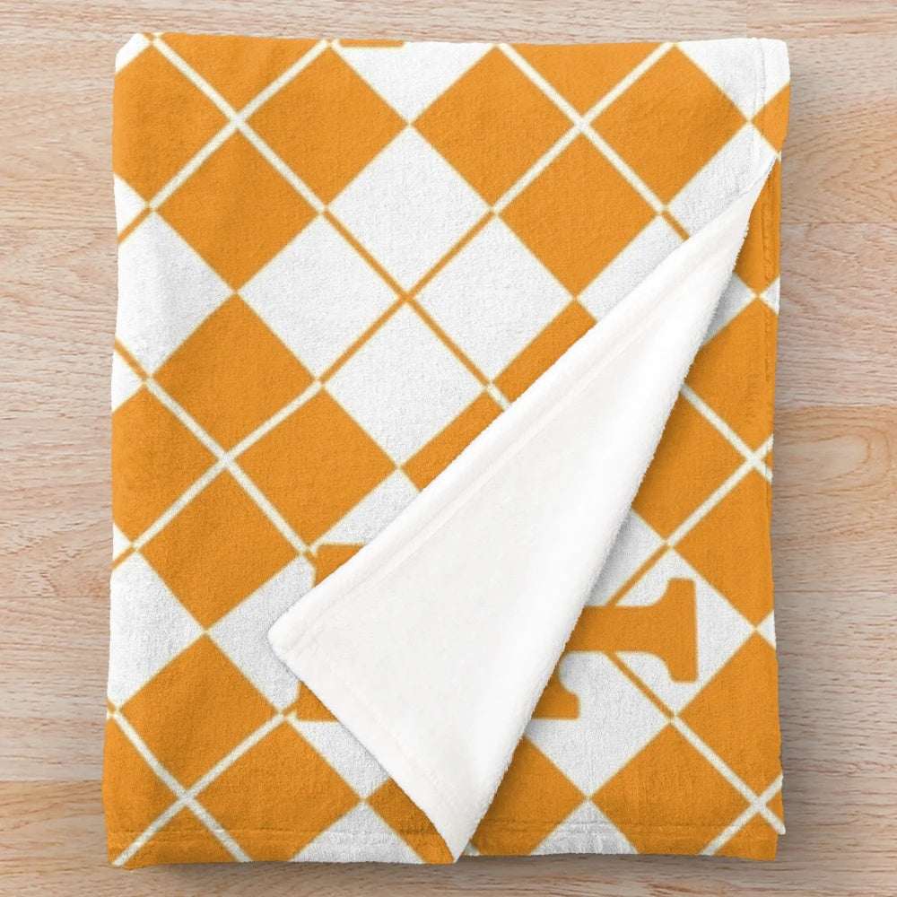 Orange and white checkerboard pattern plush blanket