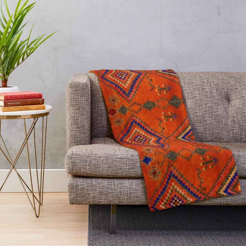 Orange Moroccan rug inspired plush blanket with abstract pattern