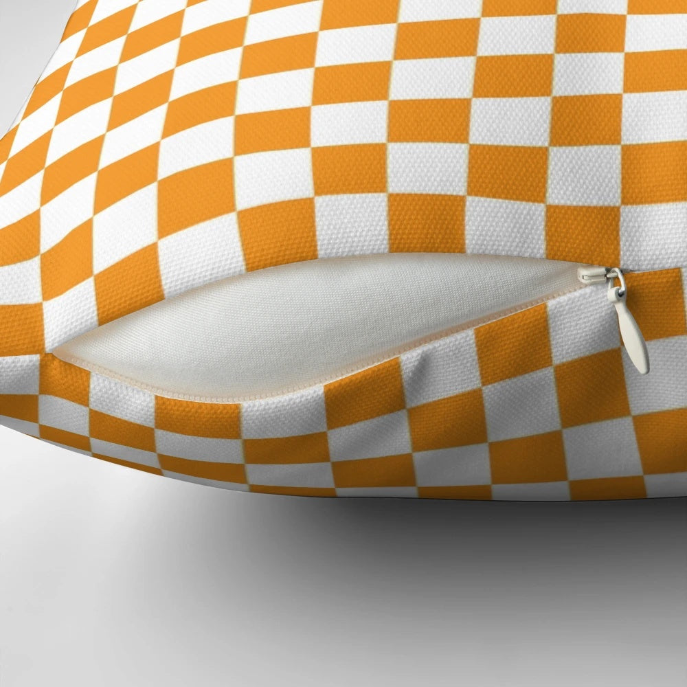 A colorful, patterned pillow featuring the iconic orange hue of the Tennessee Volunteers.