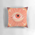 A vibrant orange pillow with a citrusy and fruity design, perfect for soothing bloodshot eyes.