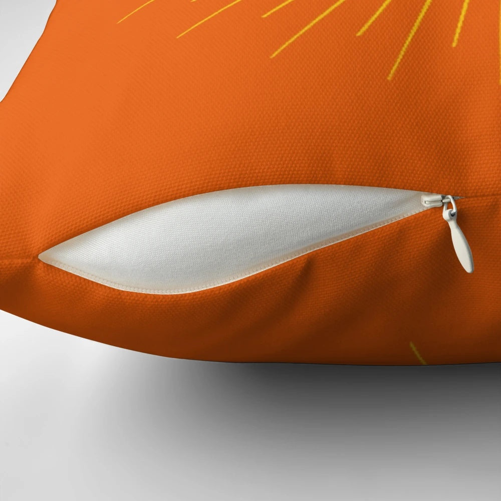 Vibrant orange pillow with Aperol spritz cocktail design