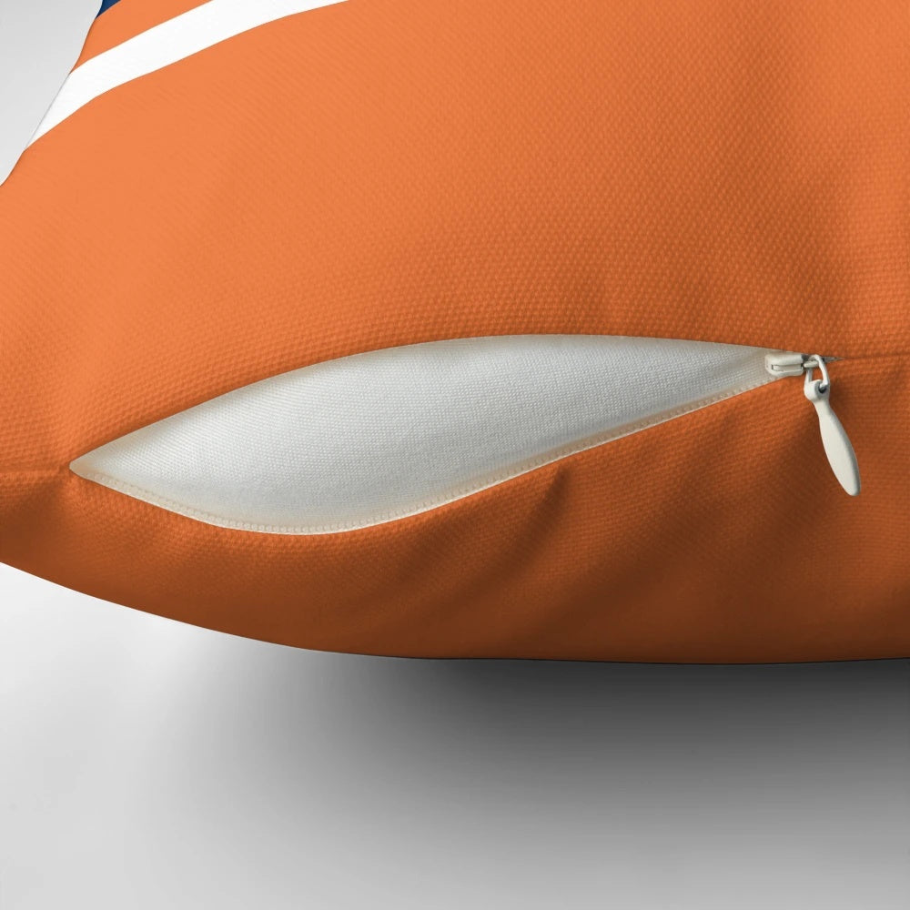 Orange, white, and navy power stripe pillow with sporty design