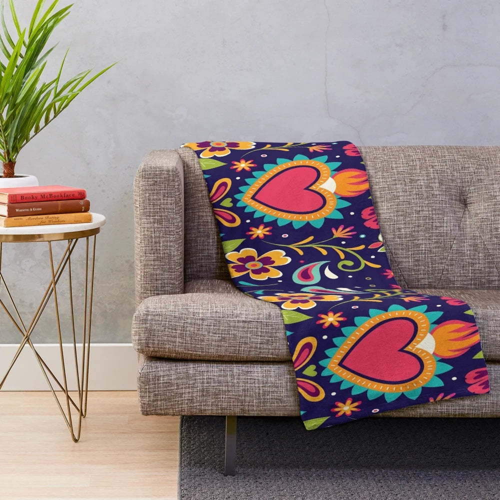 Otomi embroidered plush blanket with colorful bird and flower patterns