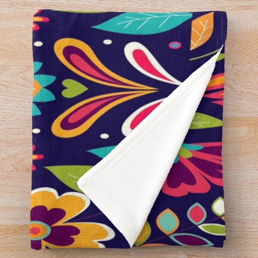 Otomi embroidered plush blanket with colorful bird and flower patterns