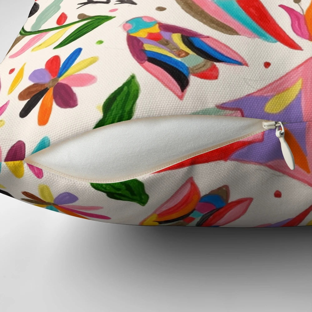 Colorful Otomi-inspired bird pattern on a decorative throw pillow