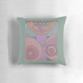 Colorful abstract pop art pillow featuring a whimsical design of people and women by award-winning author Karlyle Tomms