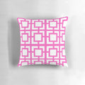 A soft, pink throw pillow with a mid-century modern breeze block design, perfect for adding a touch of Palm Springs style to your home.