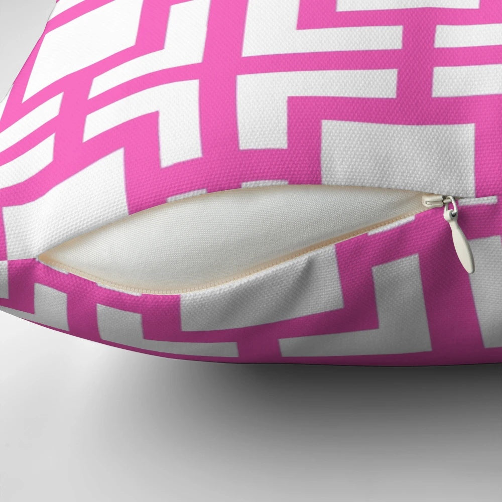 A soft, pink throw pillow with a mid-century modern breeze block design, perfect for adding a touch of Palm Springs style to your home.