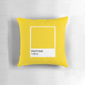 Bright yellow Pantone-inspired pillow with a fun, whimsical minion design.