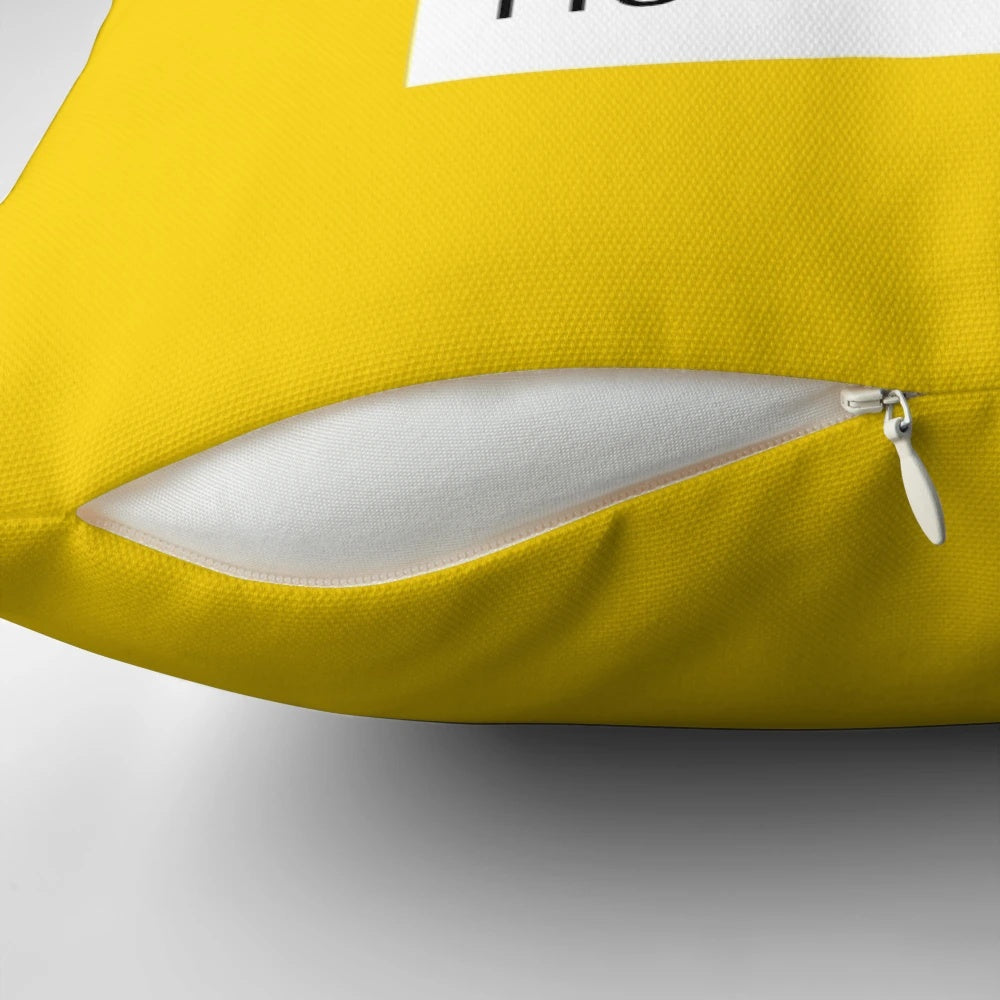 Bright yellow Pantone-inspired pillow with a fun, whimsical minion design.