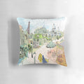 Watercolor illustration of a Paris street scene with the Eiffel Tower and Sacred Heart Basilica, featured on a decorative throw pillow.