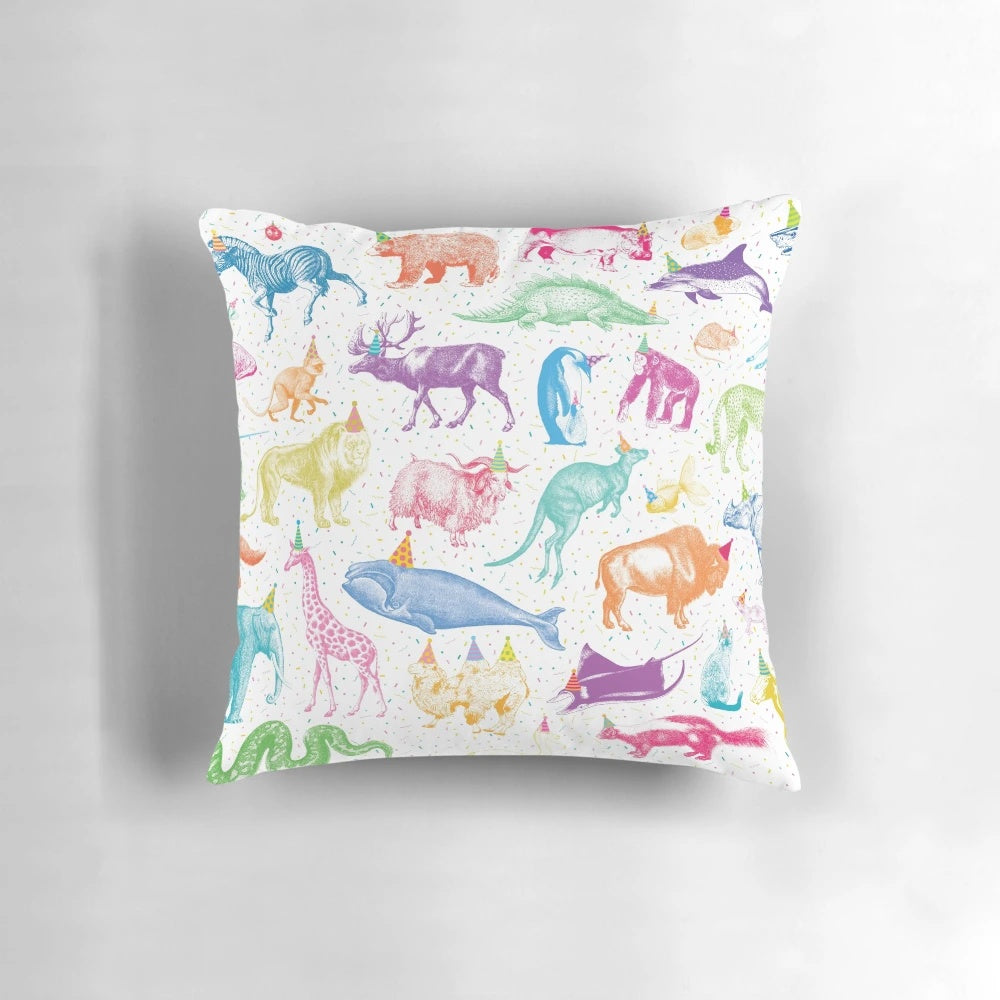 Colorful party animal throw pillows with playful confetti designs