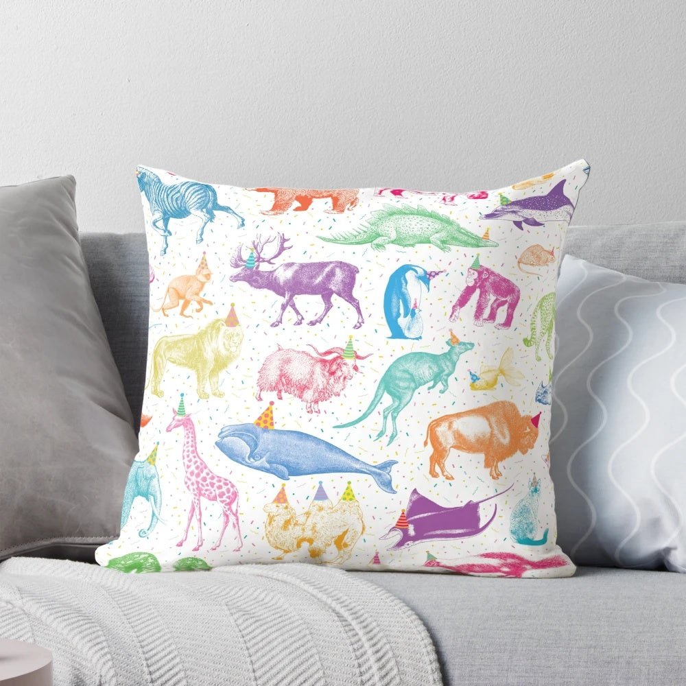 Colorful party animal throw pillows with playful confetti designs