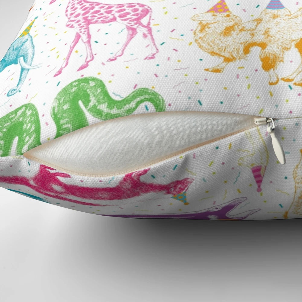 Colorful party animal throw pillows with playful confetti designs