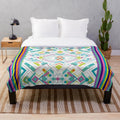 Colorful plush blanket with artist palette design and cool patterns