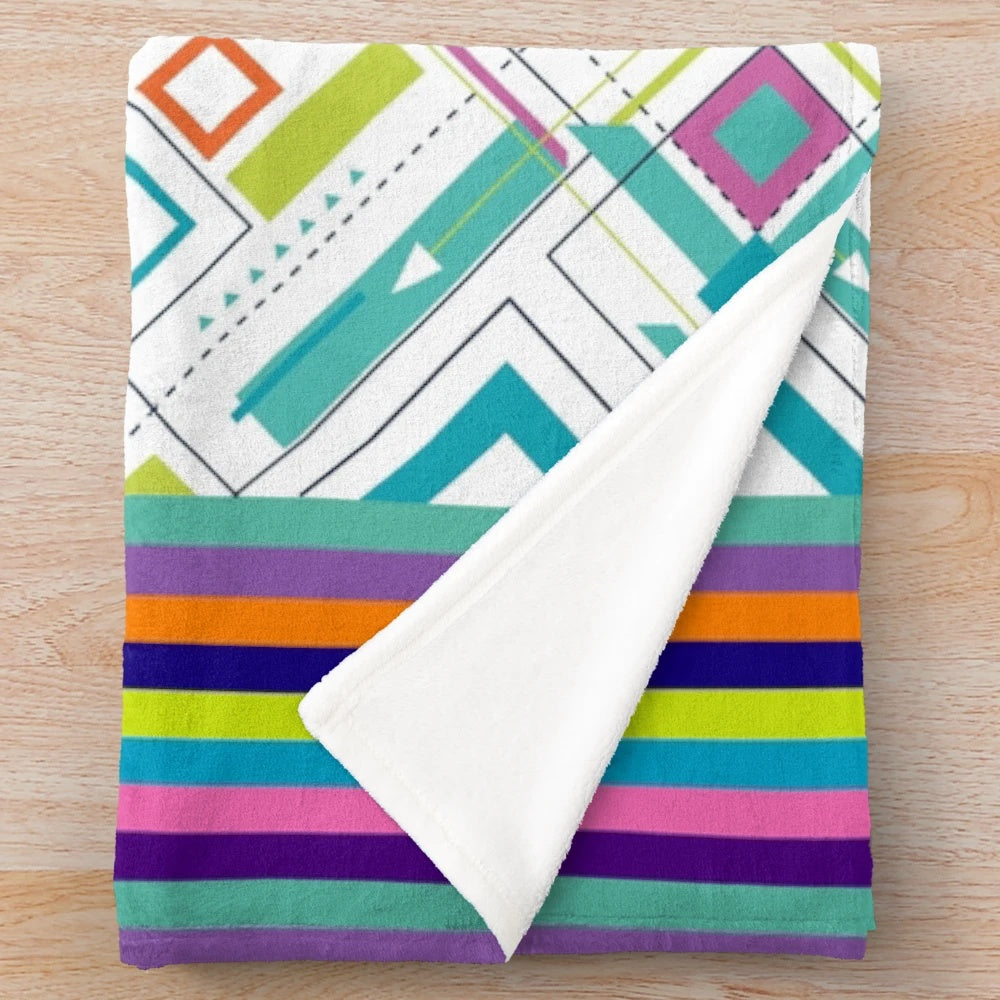 Colorful plush blanket with artist palette design and cool patterns