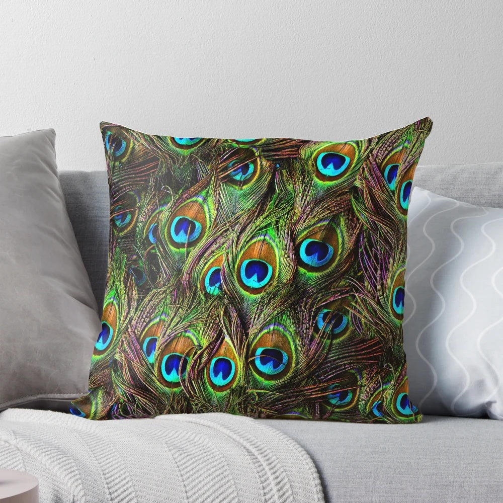 Decorative throw pillow with vibrant peacock feathers
